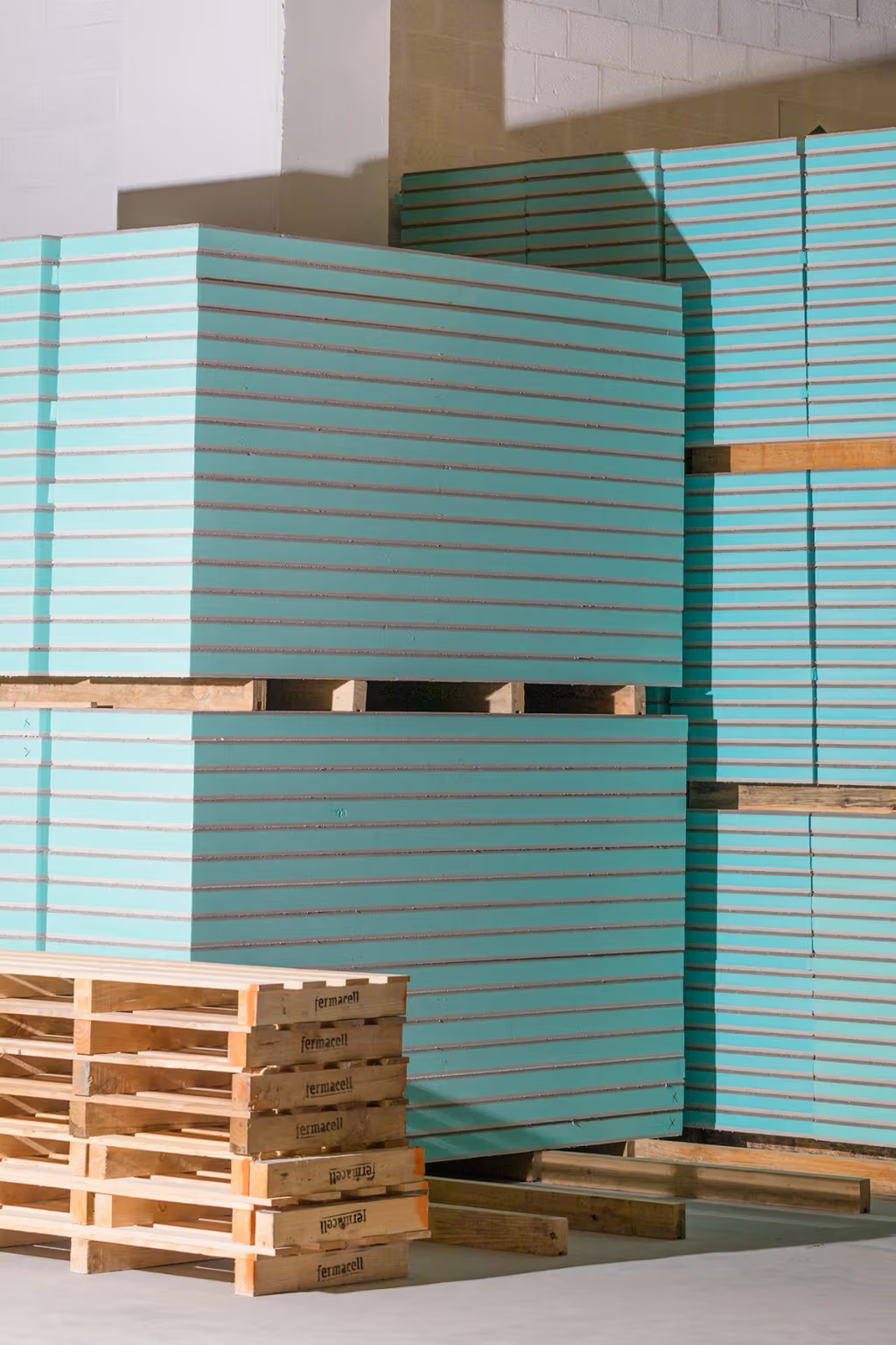 Industrial facility exterior with glazed blue cladding